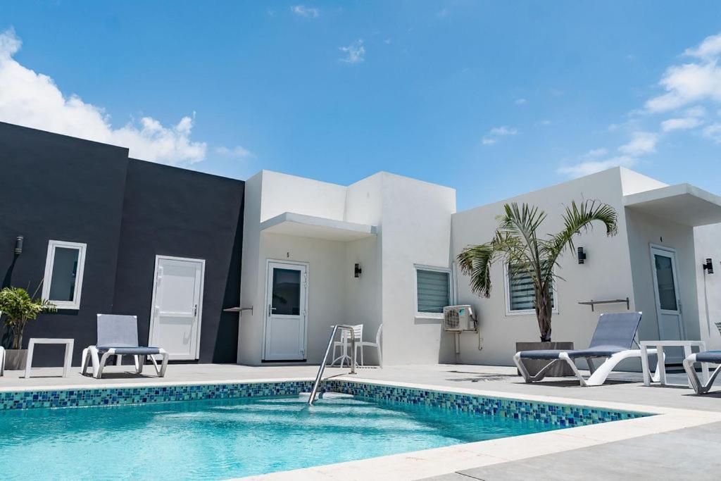 The Palm Leaf Apartments Noord Exterior foto
